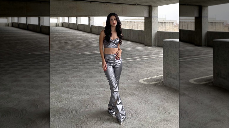 Woman in silver clothing