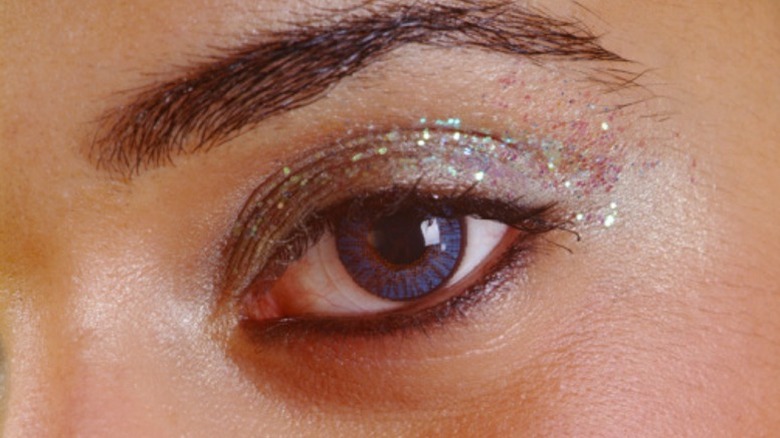 woman in sparkly makeup