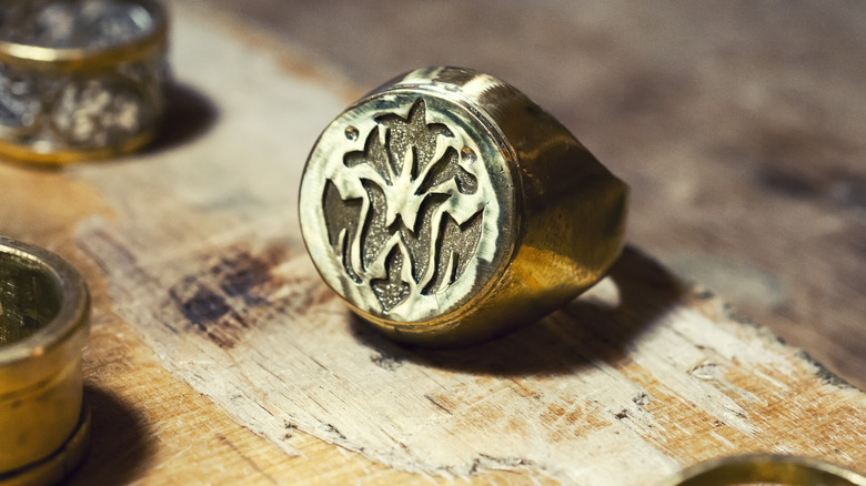 gold signet ring old table