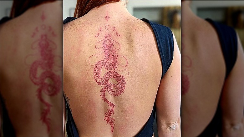 Red spine tattoo