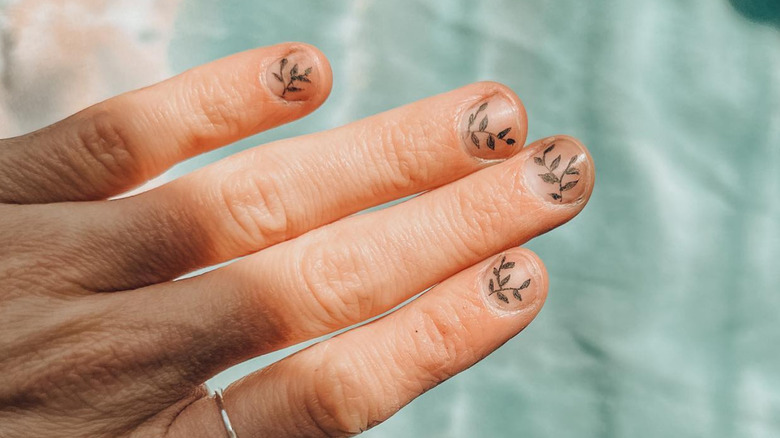 Fingernail Tattoos Take The Tiny Tattoo Trend To The Next Level