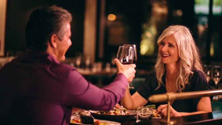 A couple drinking wine on a date