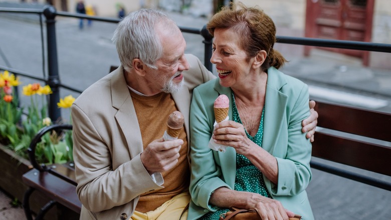 A couple eating ice cream together