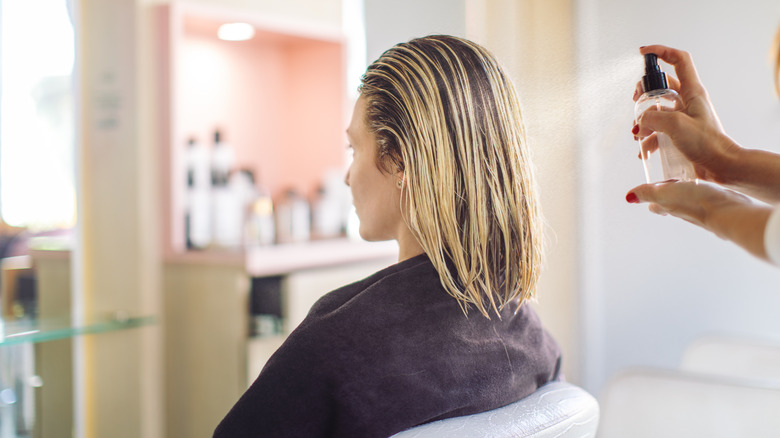 Woman at salon for hair care