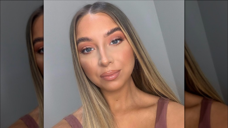 A woman on Instagram with peach gloss 