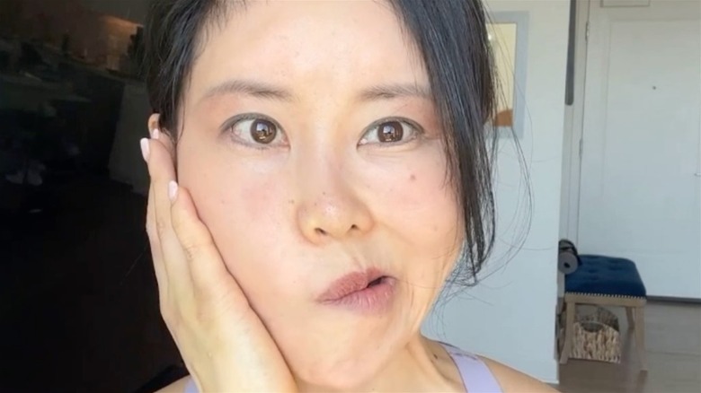 Koko Hayashi doing facial yoga
