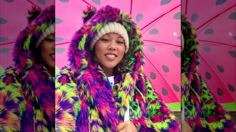 A woman wearing a SpiritHood coat