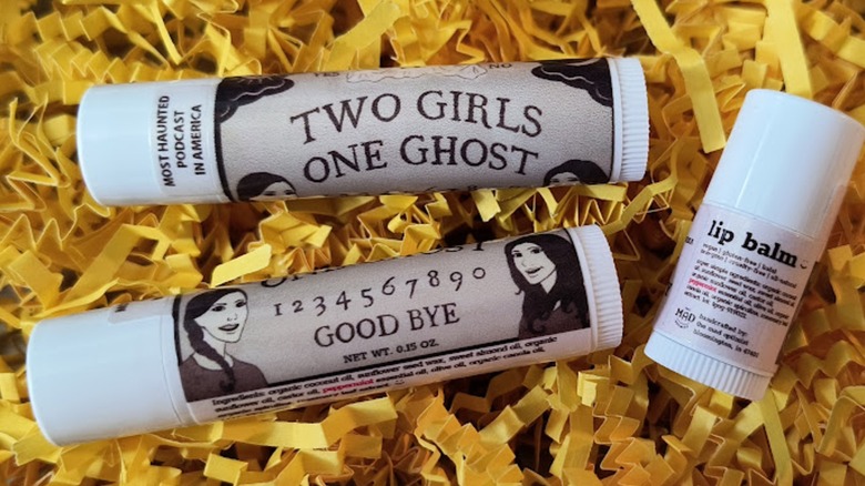 The Mad Optimist lip balms with Two Girls One Ghost branding