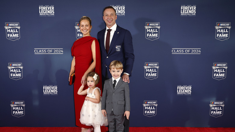 Brooke Knaus with husband Chad Knaus and their two kids at his NASCAR Hall of Fame Induction in 2024