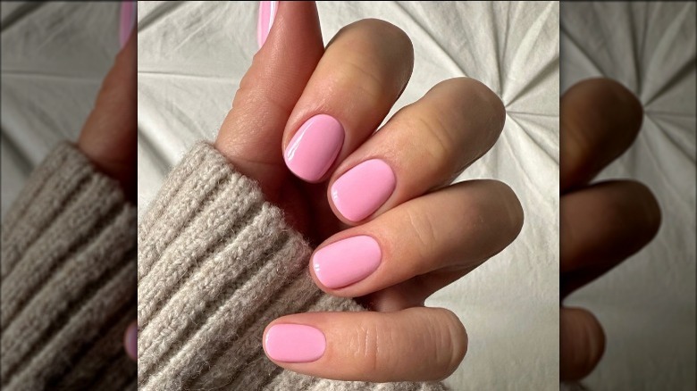 Gel manicures with medium pink polish