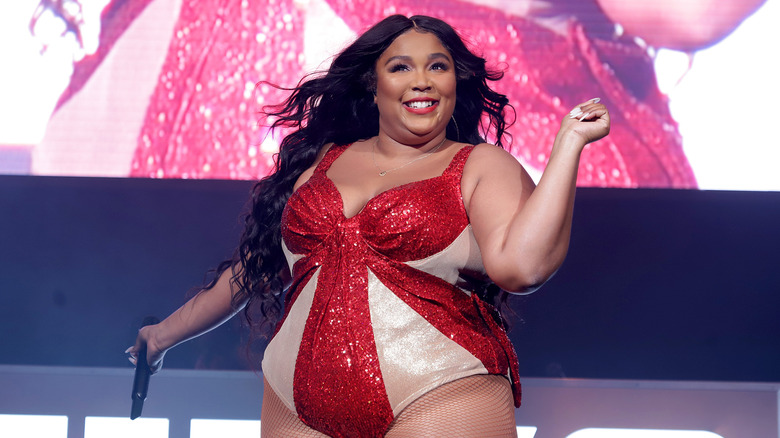 Lizzo performing onstage 