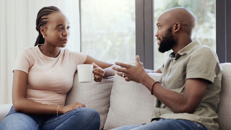 Couple having a conversation over coffee