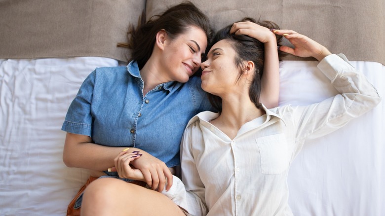 Lesbian couple in bed