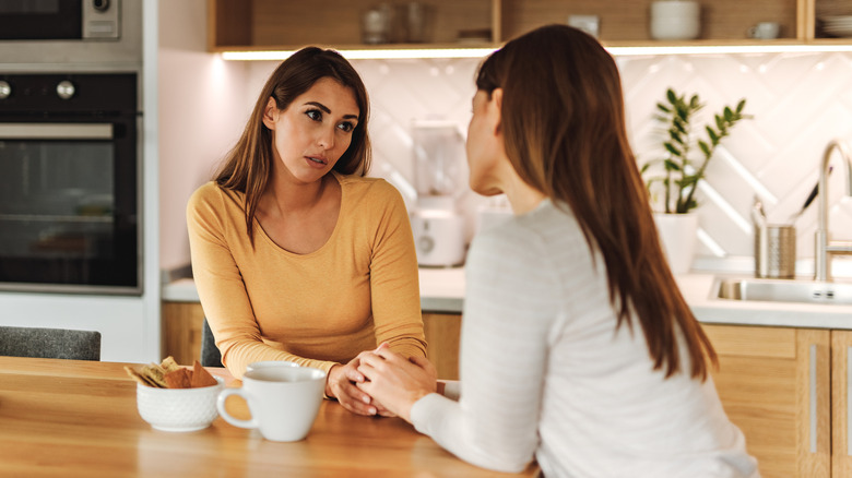 Two women talking