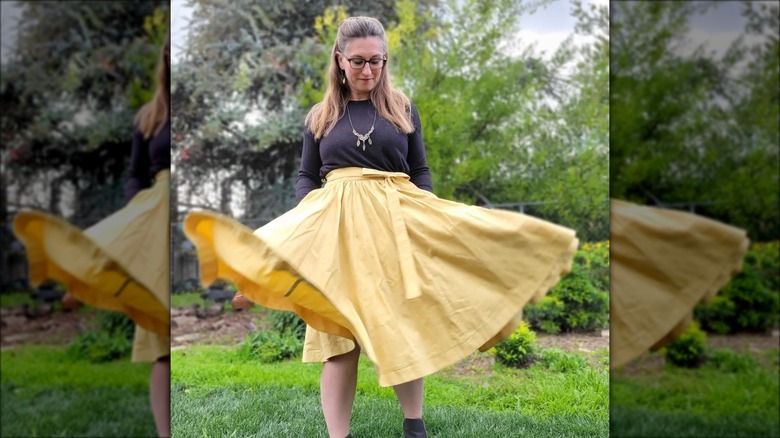 Woman in long yellow skirt
