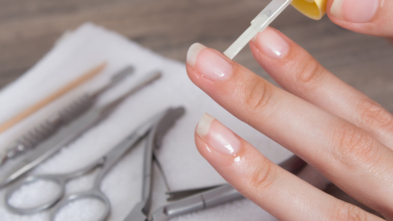 Applying nail oil