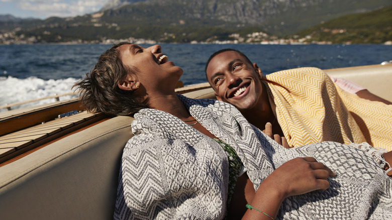 man and woman on boat