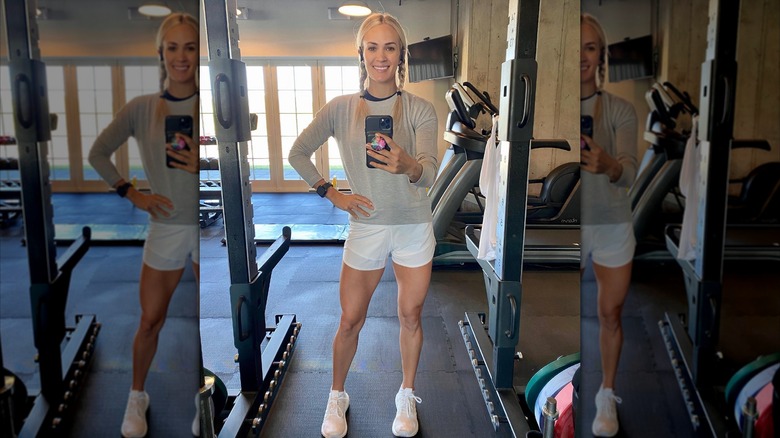 Carrie Underwood posing in the gym