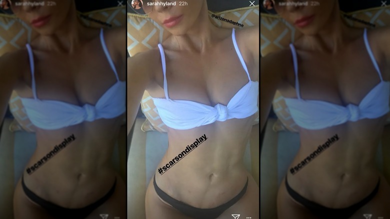 An Instagram story selfie showing Sarah Hyland's torso in a bikini