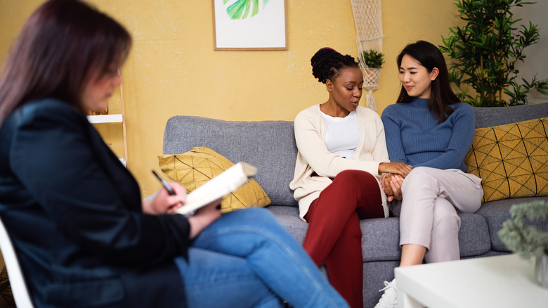 two women talking to a therapist