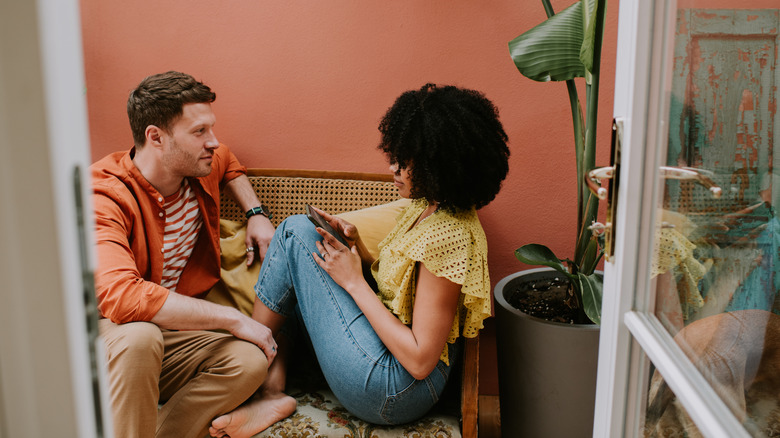 woman and man talking seriously