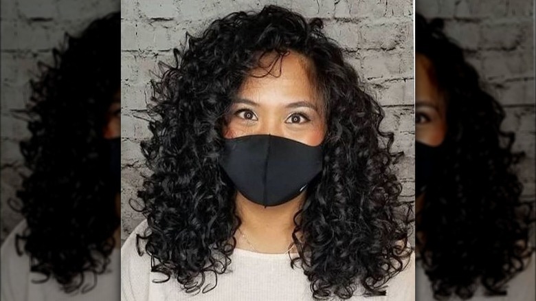 woman with spiral perm