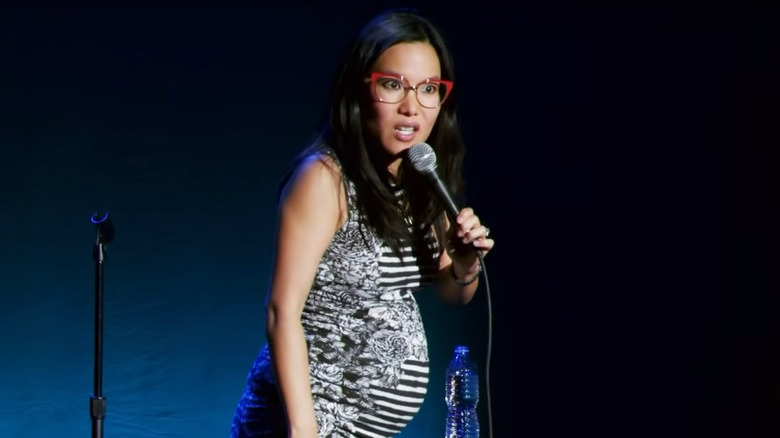 A pregnant Ali Wong doing stand-up comedy