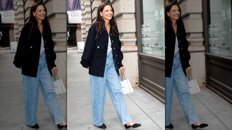 Katie Holmes in jeans and a dark jacket