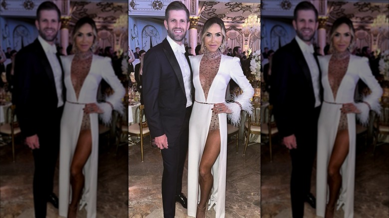 Lara Trump posing in white sparkly gown next to husband Eric Trump