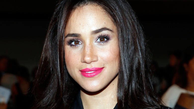 Meghan Markle with bright pink lipstick