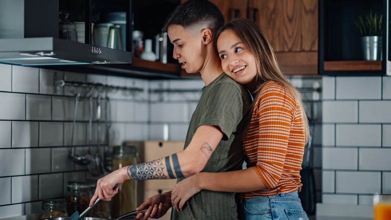 Queer couple cooking