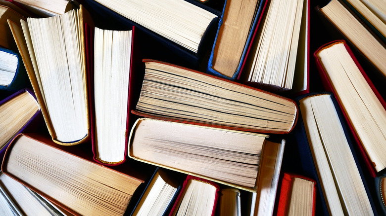 An arranged pile of books