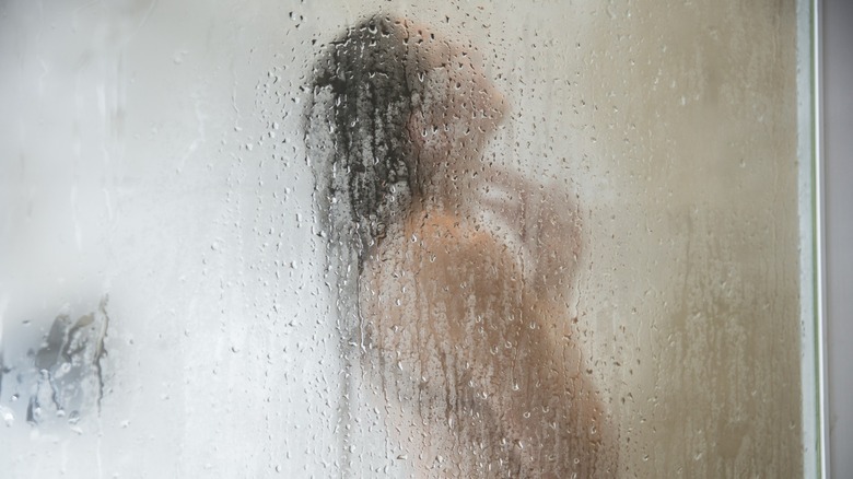 Woman taking a shower