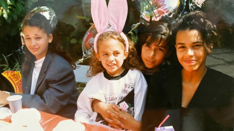 Nicole Richie as a child wearing bunny ears