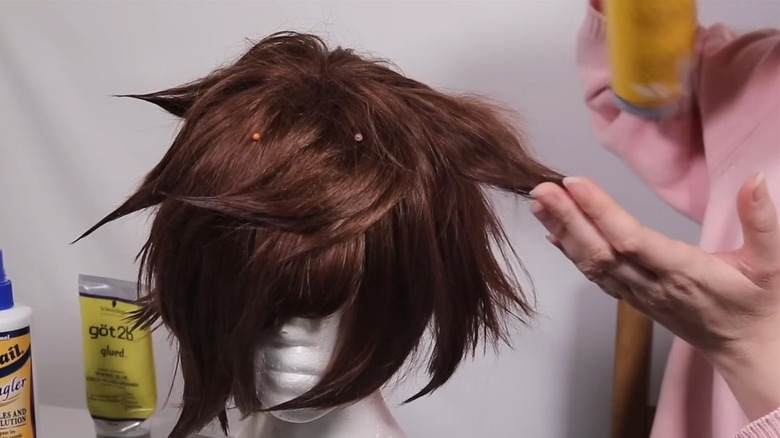 Wig being styled