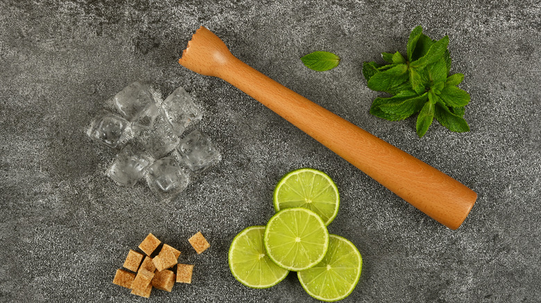 mojito ingredients and masher