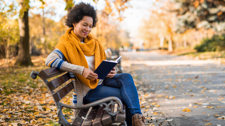 Woman reading outside