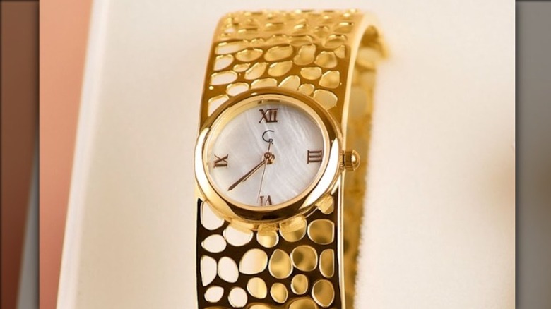 gold bangle watch