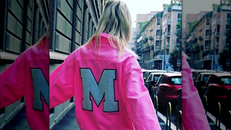 Woman in a pink denim jacket 