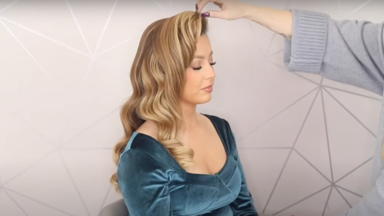 Woman with bouncy curls and blond hair