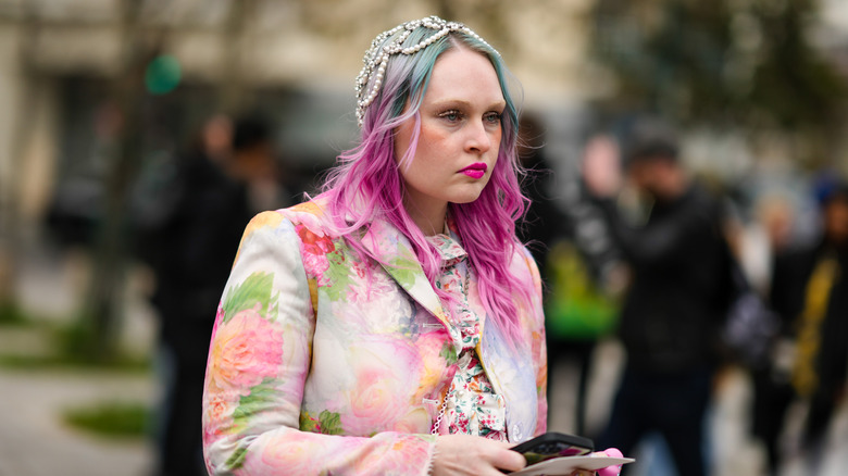 A woman with pink and blue pastel hair