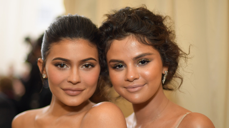 Kylie Jenner and Selena Gomez at an event 
