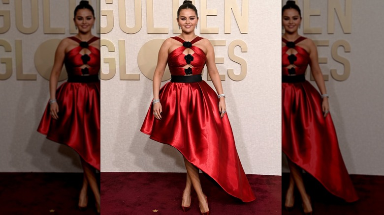 Selena Gomez in a red gown with an asymmetrical hem