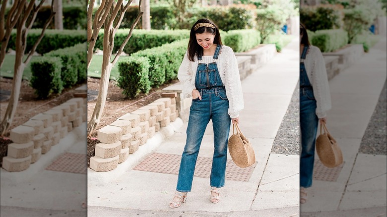 Woman in overalls and a blouse