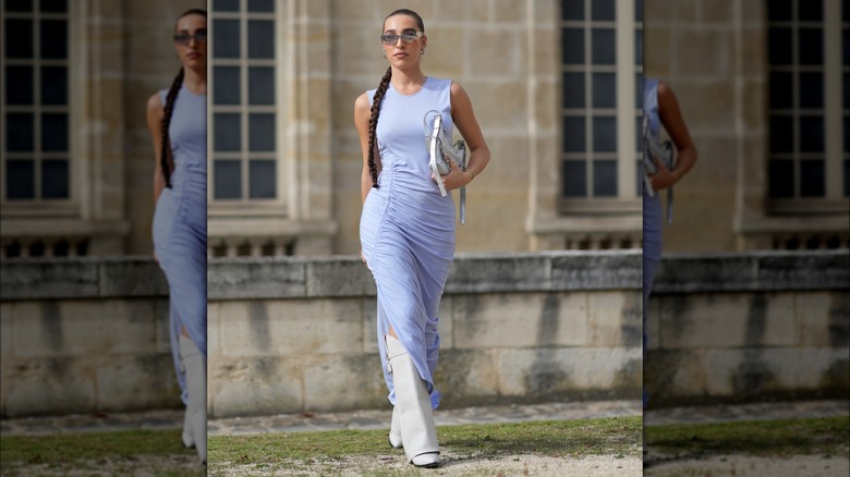 A woman in a pale blue dress 