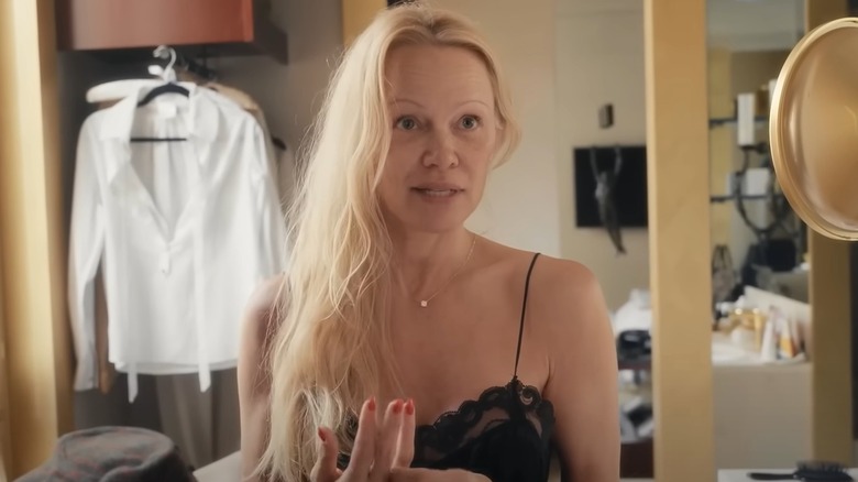 Pamela Anderson without makeup getting ready for an event