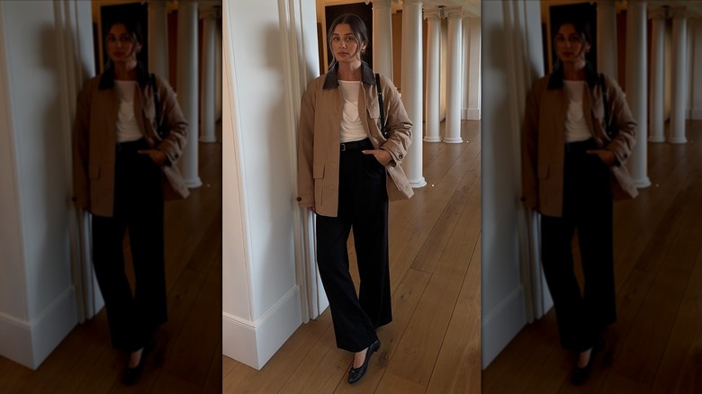 Woman in a light brown barn jacket