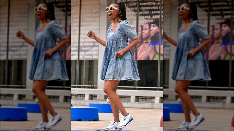 woman wearing denim mini dress