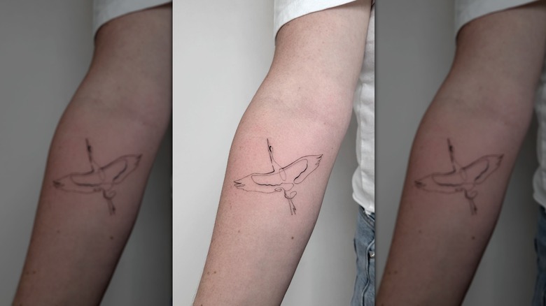 Crane fine-line tattoo