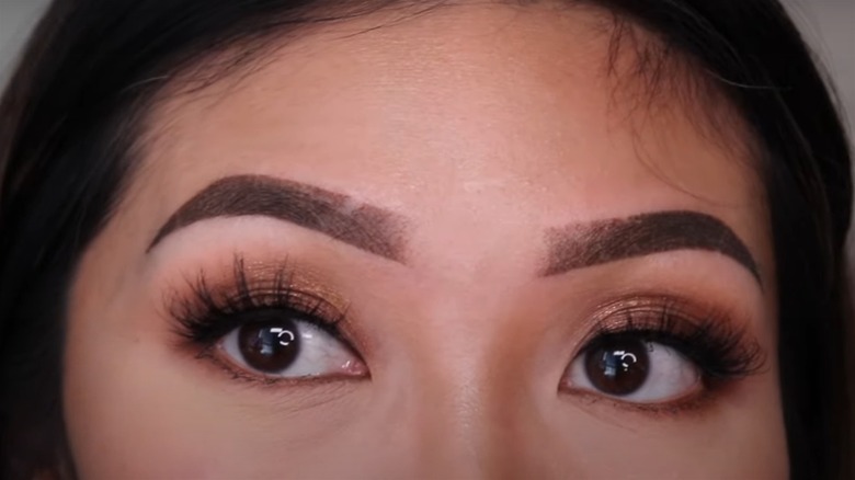 Woman after powder eyebrows